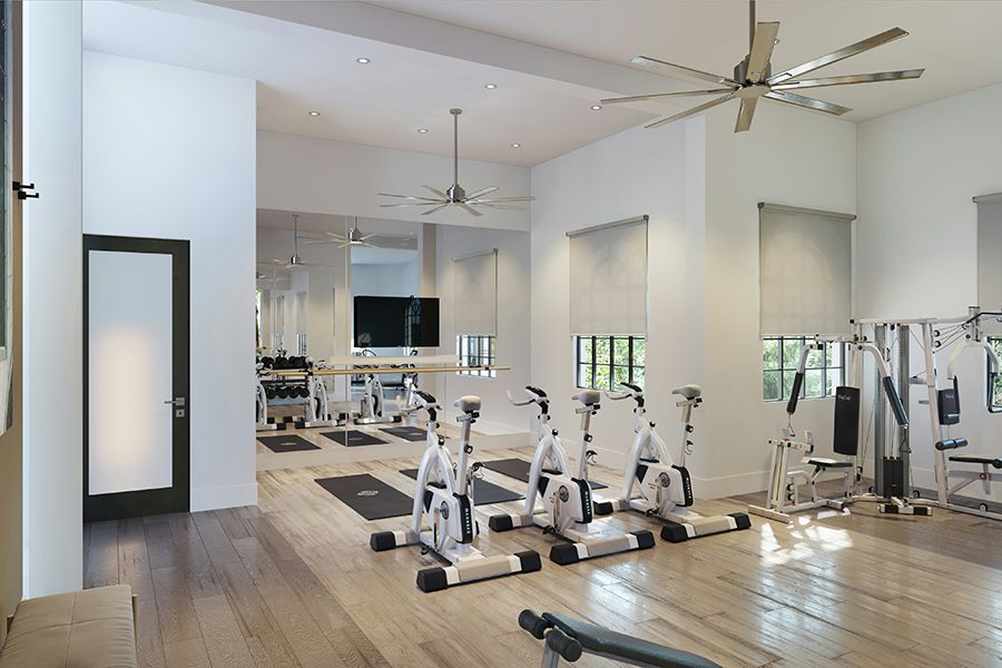 Fitness center with cardio and weight machines.